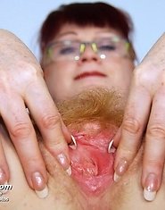 Russian nasty nurse Olga masturbates with speculum on gyno chair